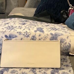Coach Elongated Pouch. Cream leather. Gold hardware NWT